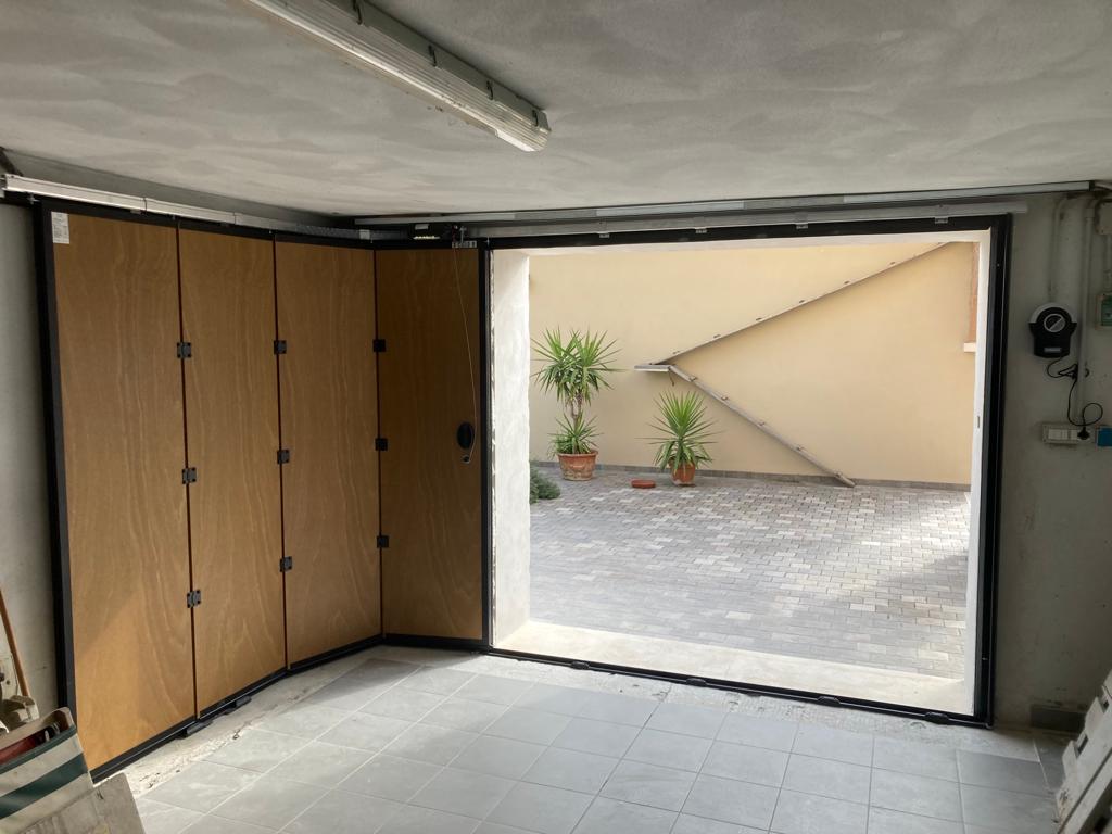 porte per garage sezionale a scorrimento laterale elettro secur arezzo