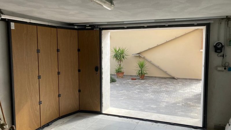porte per garage sezionale a scorrimento laterale elettro secur arezzo